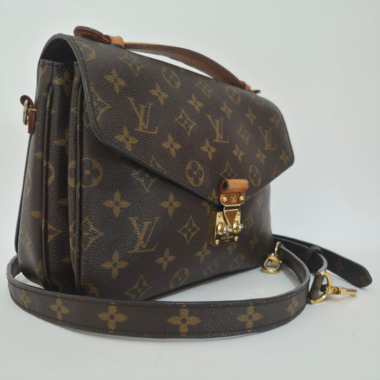 Pochette métis in tela monogram