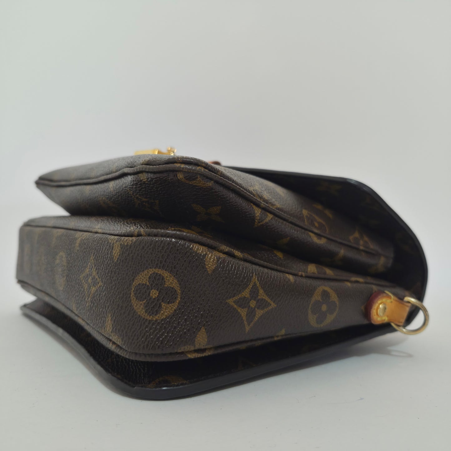 Pochette métis in tela monogram