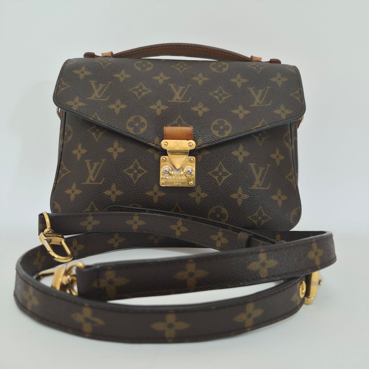 Pochette métis in tela monogram