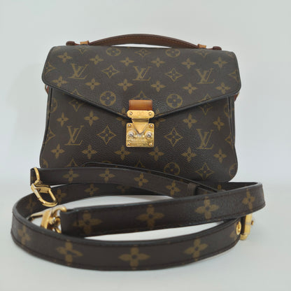 Pochette métis in tela monogram
