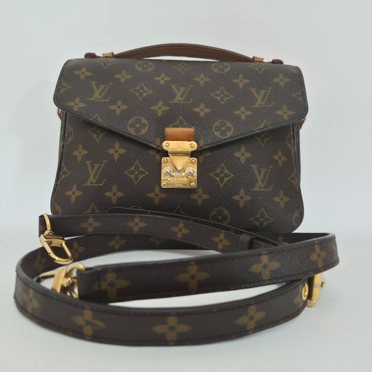 Pochette métis in tela monogram