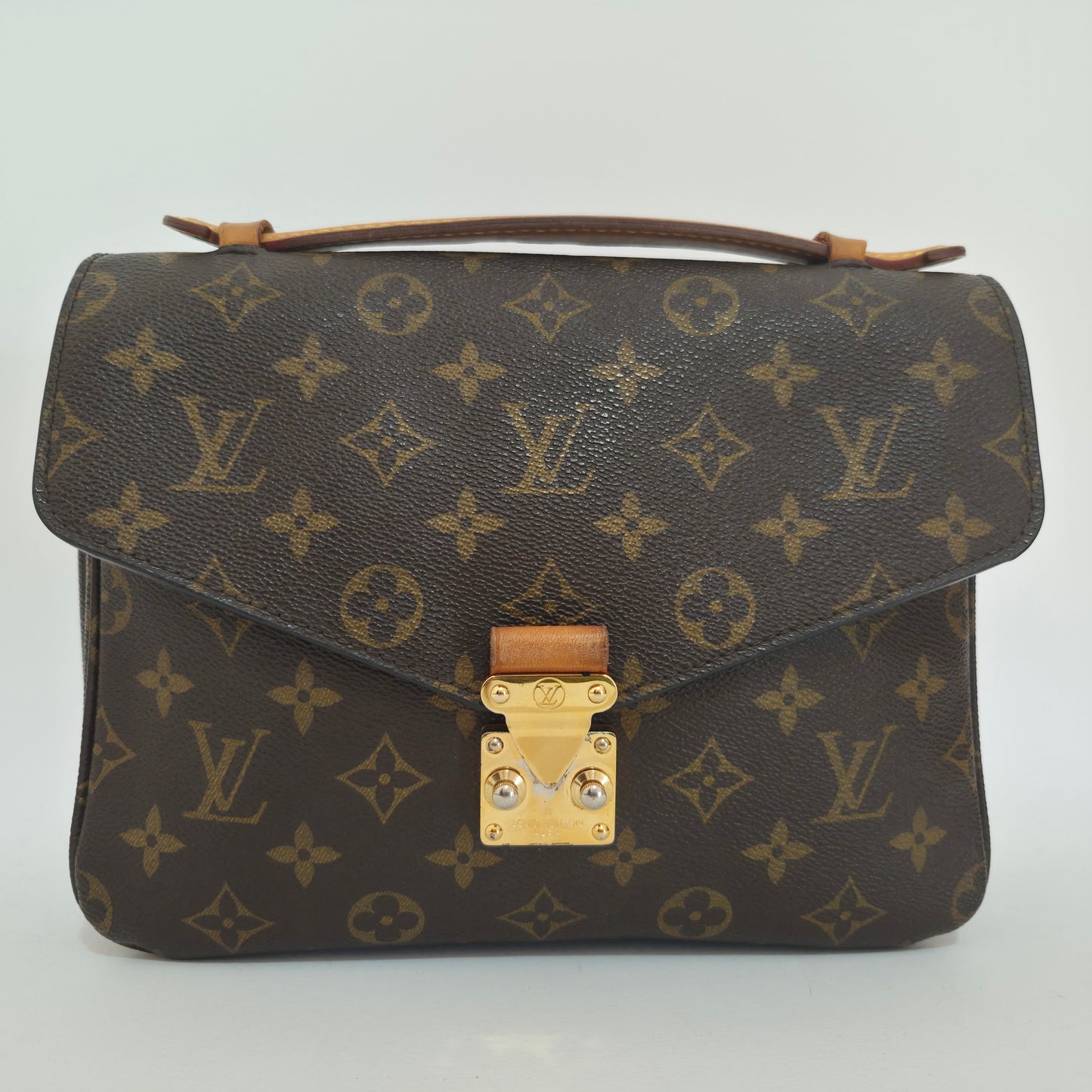 Pochette métis in tela monogram