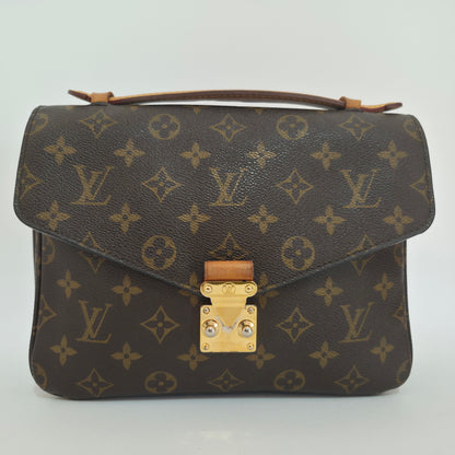Pochette métis in tela monogram