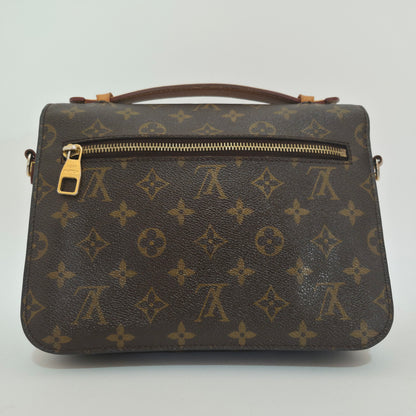 Pochette métis in tela monogram
