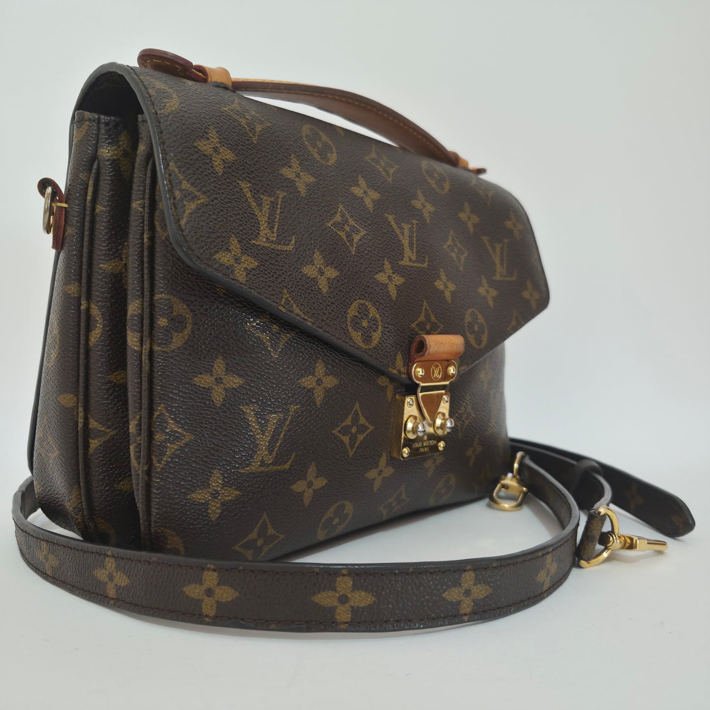 Pochette métis in tela monogram