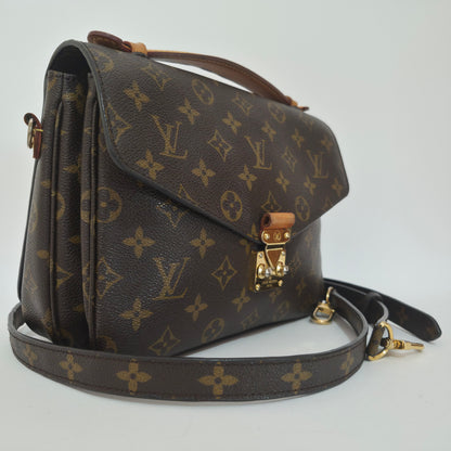Pochette métis in tela monogram