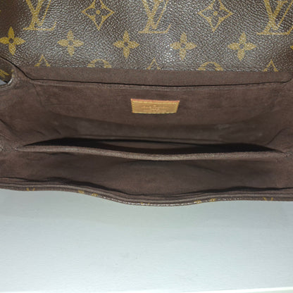 Pochette métis in tela monogram