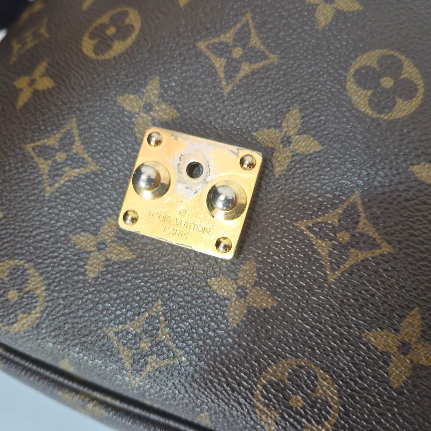 Pochette métis in tela monogram