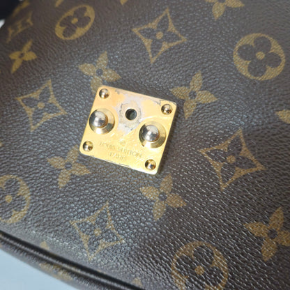Pochette métis in tela monogram