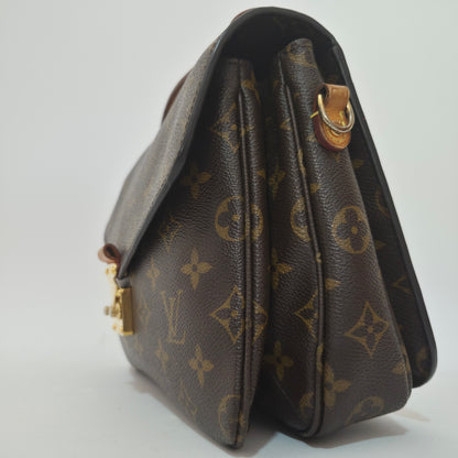 Pochette métis in tela monogram