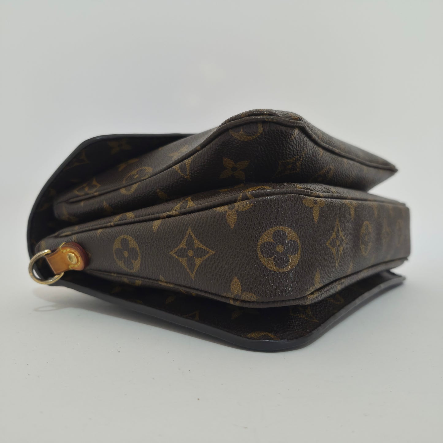 Pochette métis in tela monogram